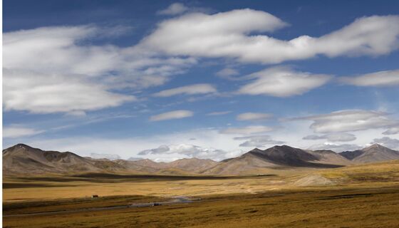 An ancient land born from the collision of colossal tectonic plates shaped by the monumental forces of primordial elements.